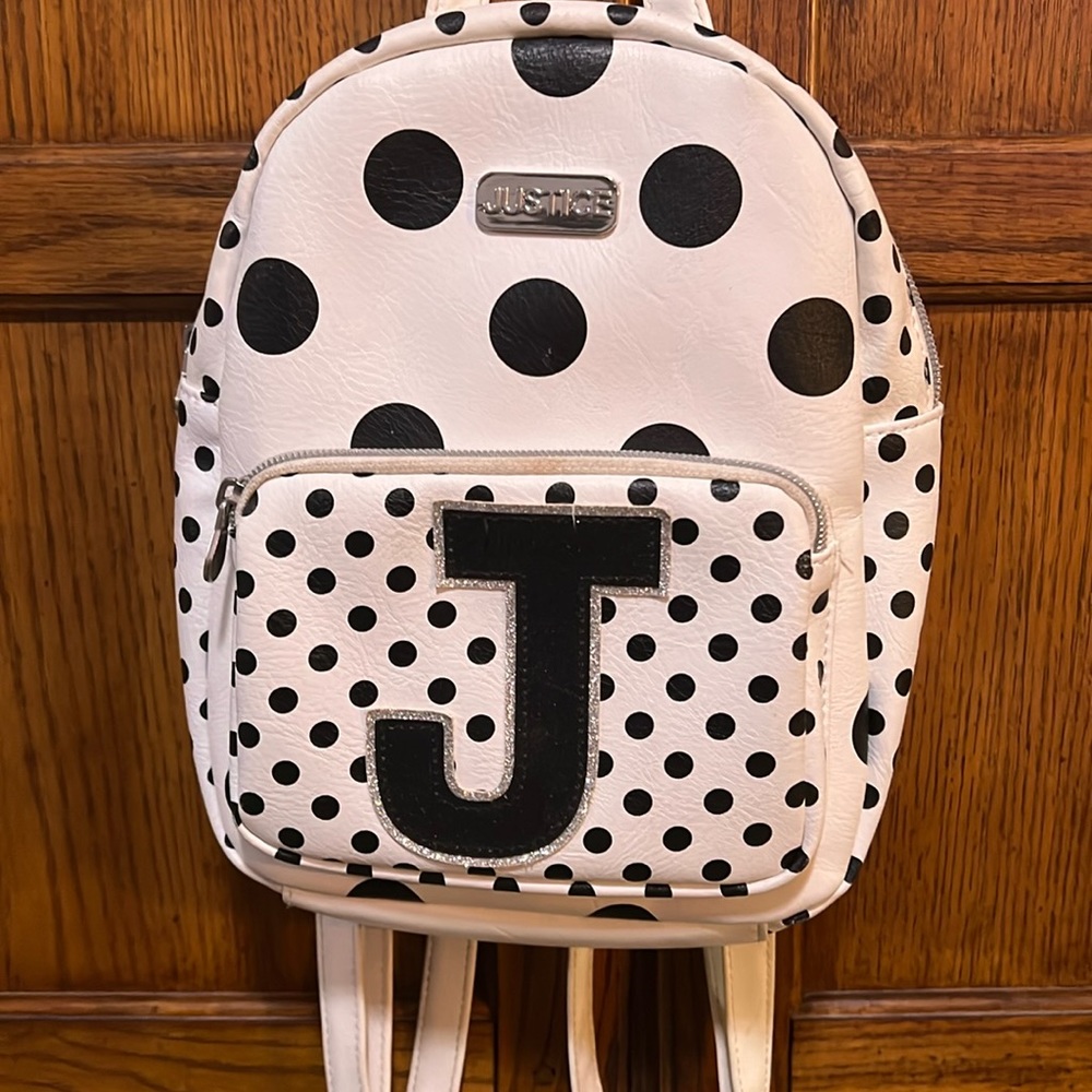Justice mini backpack with initial J on it